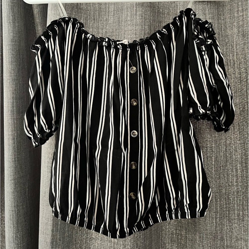 Mi Ami top, from Francesca’s. Off the shoulder black with white and tan stripes.